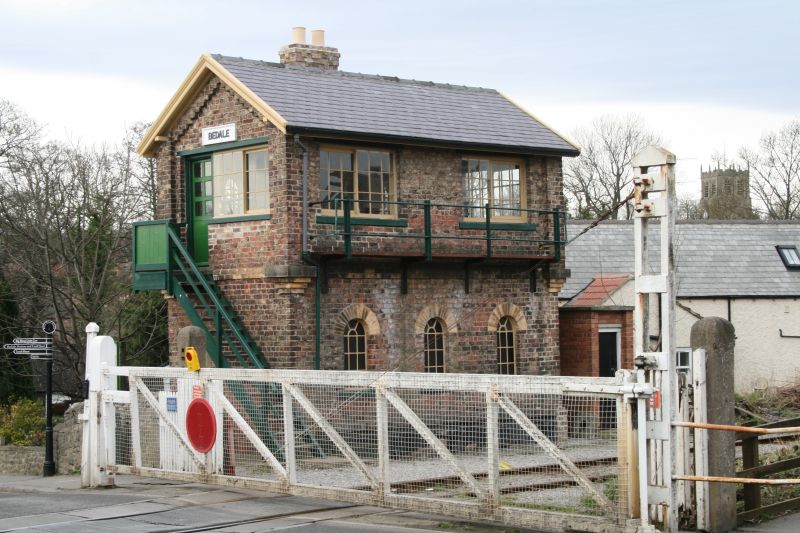 Aiskew Signal Box is a grade 2 listed building, first listed in 16th of February 1993. The 1860s Signal Box was possibly designed by G. T Andrews for the Northallerton - Bedale line. 